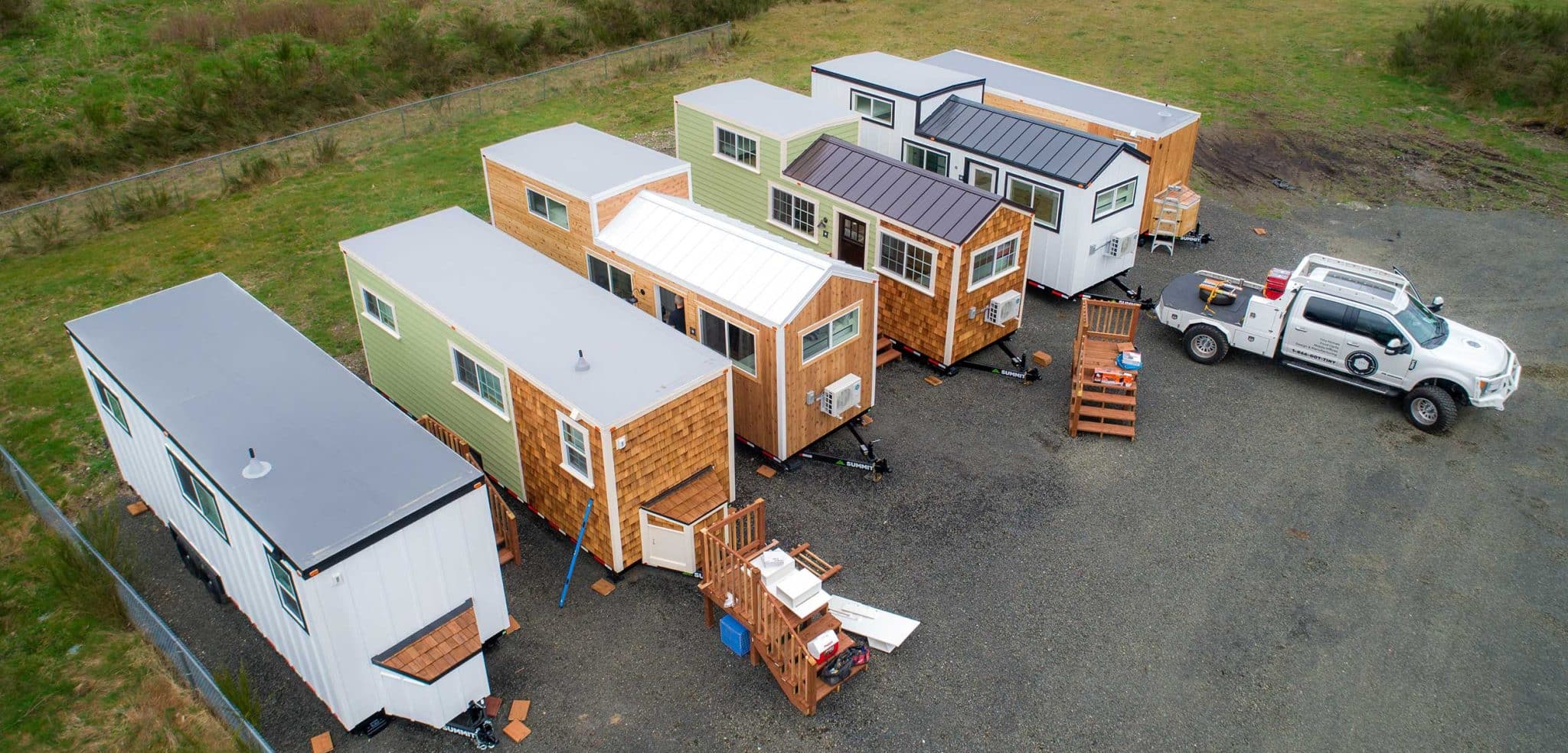 overhead shot of five tiny homes used for workforce housing